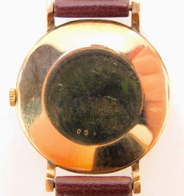 A Jaeger Le Coultre gentleman's 9ct gold cased wristwatch, the gold coloured circular dial bearing baton pointers, back case numbered 0547, on Darlena brown leather strap, case diameter 3.2cm. - 3