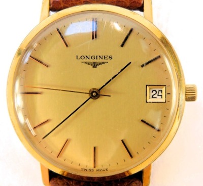 A Longines gentleman's wristwatch, the circular gold coloured dial bearing baton pointers and date marker, in gold coloured casing with stainless steel back numbered 19282452, on a Condor brown leather strap, face diameter 3.3cm. - 2