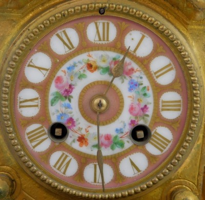 A 19thC French gilt metal mantel clock, the circular enamel dial bearing Roman numerals and decorated with flowers, eight day, the case surmounted by two cherubs, above an ornate floral and scroll cast base with floral painted enamel roundels and plaque t - 2