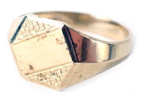 A 9ct gold signet ring, the ring head of hexagonal form with vacant central shield and hammered outer design, ring size S½, 4.2g.