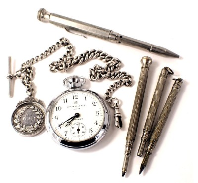 An Ingersol Triumph pocket watch, four plated and stainless steel pencil cases, a silver shield fob depicting Bulldog, and a silver curb link watch chain, 36cm long, 58.6g all in.