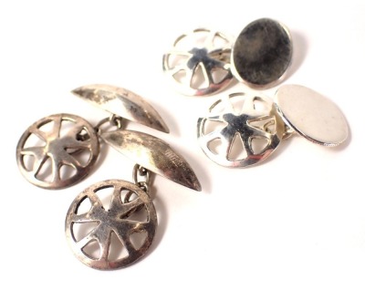 Two pairs of cufflinks, comprising a pair of silver wheel set cuff links with oval backs, and another with marquise shaped backs, 13.4g all in.