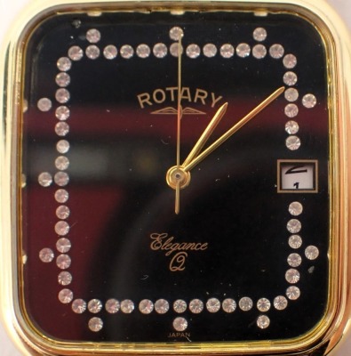 A Rotary Elegance wristwatch, with a black square set face set with crystals, with a date aperture, in gold coloured strap with stainless steel back, boxed. - 2