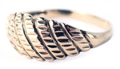 A 9ct gold dress ring, the ring head of boat shaped form with etched markings, ring size S, 2g all in.