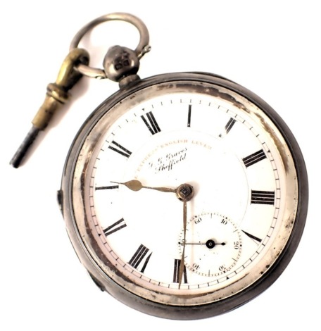 A Edward VII silver pocket watch, white enamel Roman numeric dial, gold hands, seconds dial, the express English lever movement inscribed FG Greaves of Sheffield, Chester 1904, keywind, 130.1g.