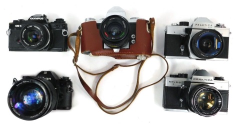 Four various cameras, to include a Nikon EM, Praktica LTL, Praktica IV, Praktica MTL5B, and an Olympus OM-4. (5)