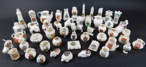 A collection of various crested china ornaments, to include W H Goss, Carlton China, Willow Art, and others. Mainly ancient pots, lighthouses, pigs, Bulldog, etc. (50)