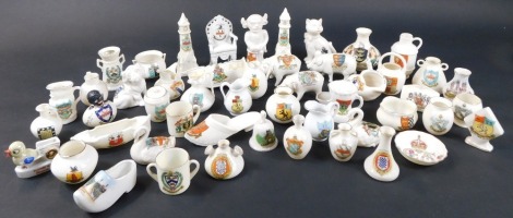 A collection of various crested china ornaments, to include W H Goss, Savoy China, Waterfall China, and others, including a Lincoln Imp, ancient pots, pigs, birds, etc. (50)