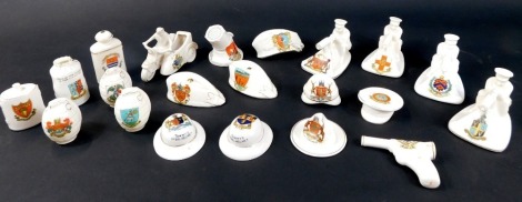 A collection of crested china World War One interest, to include Arcadian Tommy with machine gun (x4), Willow Art Tommy's helmet, Swan China pistol, etc. (21)