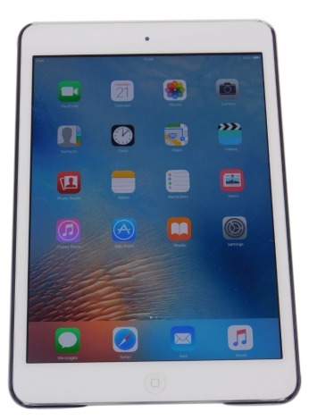 An Apple iPad Mini, 56.5GB, model number MD533X/A, serial number F85LD1D6F198, in white, boxed.