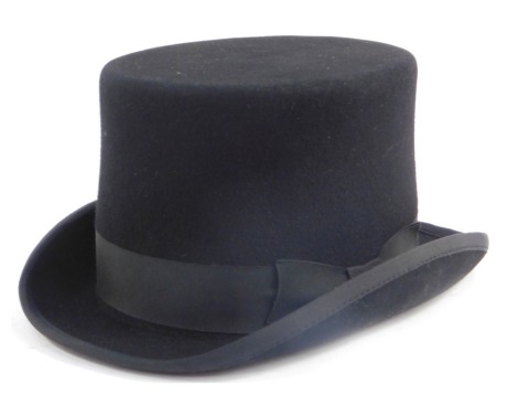 A Wilson of Stafford black top hat, size UK 6 7/8.