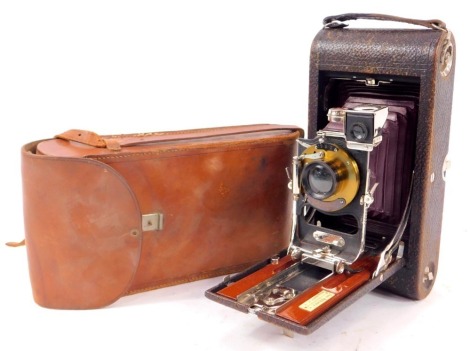 A Kodak folding pocket camera No 3A, in leather case.