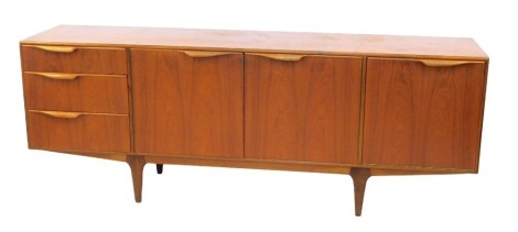 A teak sideboard, with arrangement of drawers and doors, 202cm wide.