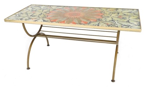 A 1960s metal coffee table, with faux butterfly wing ground top, 98cm x 45cm.