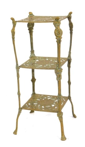 A cast brass three tier etagere, 72cm high, 30cm square.