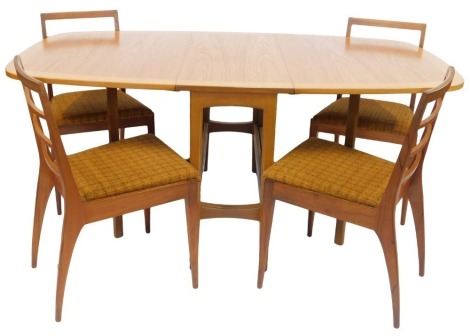 A teak drop leaf table, together with four teak McIntosh Model 9073 ladder back chairs. (5) The upholstery in this lot does not comply with the 1988 (Fire & Fire Furnishing) Regulations, unless sold to a known exporter or upholsterer it will be cut from t