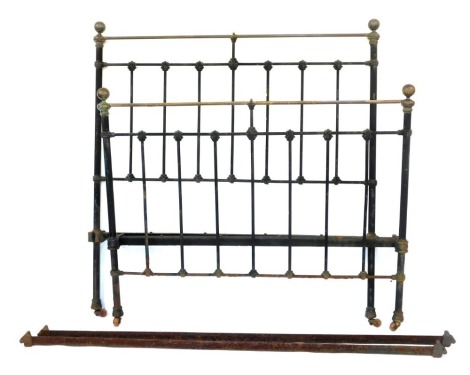 A Victorian brass and iron single bedstead.