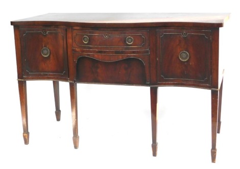 A Georgian style mahogany serpentine fronted sideboard, fitted with two central drawers, flanked by cupboards, on square tapered legs on spade feet, 91cm high, 143cm wide, 61cm deep.