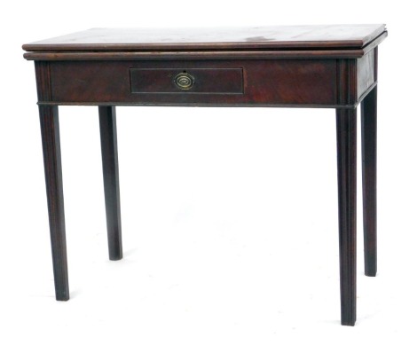 A George III mahogany tea table, fitted with a single drawer to the frieze, raised on moulded tapered legs, 73cm high, 90cm wide, 45cm deep.