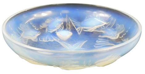 A 1920s/1930s French iridescent glass bowl, in the manner of Lalique, decorated with fish, starfish, shells, etc. raised stamp France, 25cm diameter.