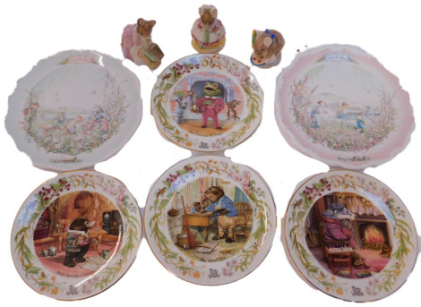 Three Royal Albert Beatrix Potter pottery figures, modelled as The Old Woman Who Lived in a Shoe Knitting, Hunca Munca Sweeping, and Appley Dapply, together with four Aynsley The Wind in the Willows collectors plates, and two others.