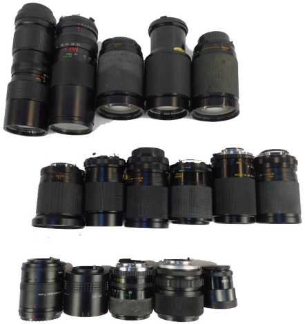 An assortment of camera lenses, including three Vivitar telephoto lenses, macro focusing zoom, etc. (16)