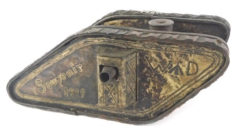 A WWI prisoner of war brass, copper and plated model of a tank, engraved to the side 283 POW COY,EPEHY, the reverse engraved souvenir 1919 W.D with an arrow.