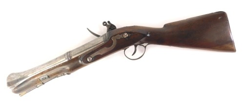 A late 18th/early 19thC blunderbuss, with part faceted steel barrel, walnut stock, and engraved with lion and numbered 3, 52cm long.