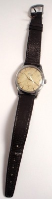 An Omega Seamaster gent's wristwatch, with a silvered mottled dial and gold numeric batons, with gold hands and seconds dial, in a stainless steel case, on a brown leather strap, the dial 3cm diameter. - 5