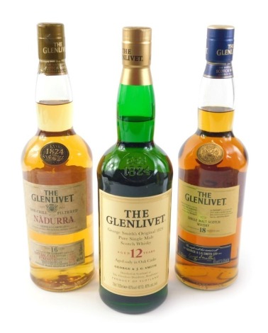 Three bottles of Glenlivet whisky, Nadura bottled 2007, batch number 1007D, Glenlivet 18 years single malt scotch and another titled The Glenlivet, all boxed.