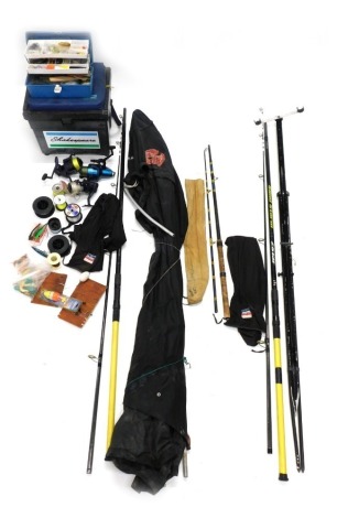 A quantity of sea fishing rods, accessories, to include Two Daiwa ZS13F Sandstorm 12ft rods, two Okuma Backcaster 4.5:1 spool reels, Olympiaz spool reel, beach rod rest, and a tackle box containing lure, sea floats, traces, spools, etc.