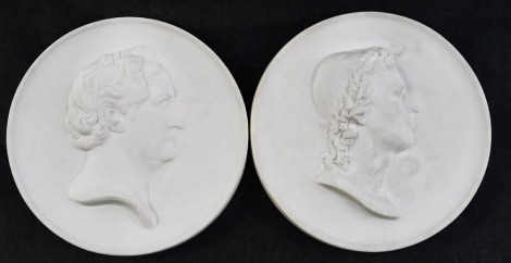 A pair of Meissen bisque porcelain plaques, for Johann Wolfgang Goethe and Friedrich Schiller, raised details to reverse and the blue cross swords mark, 10cm diameter.