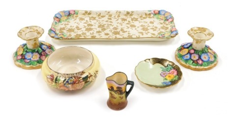 A Tuscan china dressing table set, comprising rectangular tray, two candlesticks and a pin tray, a Royal Doulton seriesware miniature jug, decorated with cottage and sheep, and a Maling bowl. (6)