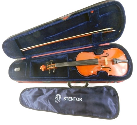 A Stentor student violin, with bow and fitted case. (AF)