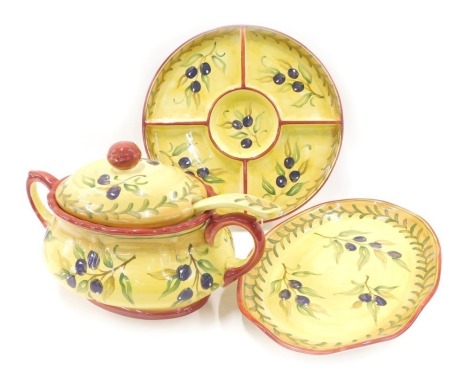 An Oliver's Olive kitchen ware set, comprising tureen cover and serving ladle, serving plate and hors d'oeuvres type dish.