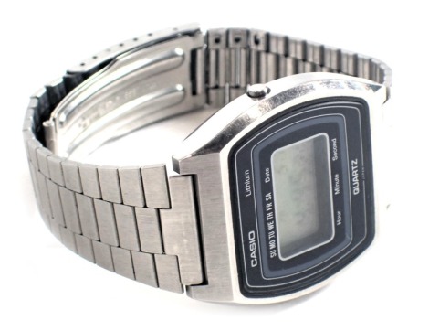 A Casio Lithium Quartz digital watch, in stainless steel case and strap, boxed.