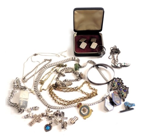 A group of assorted costume jewellery, to include silver charm bracelet, cap badges, dress ring, butterfly wing dress ring, silver curb link identity bracelet, etc. (1 box)