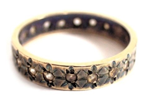 A 9ct gold eternity ring, of star set design, set with CZ stones, ring size N½, discoloured, 2.6g all in.