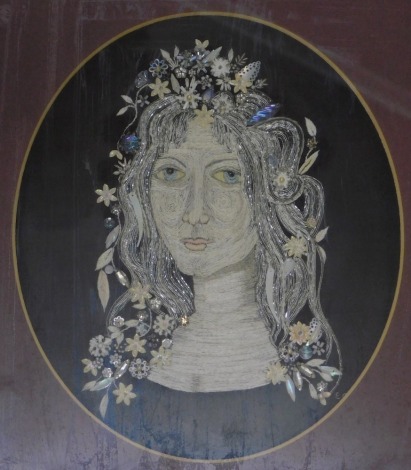 A 20thC embroidered portrait, embellished with silver metallic thread, sequins, beads, etc. indistinctly signed, 26cm x 22cm.