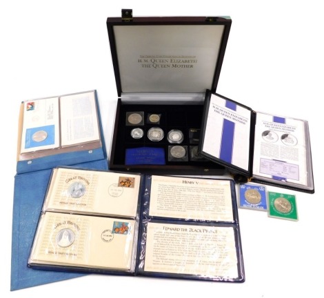 A collection of coins, to include silver five dollars, two one dollars, nickels, silver crowns, United Nations coin covers, and medallic first day covers.