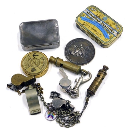 A quantity of whistles, to include of Great Northern Railway brass example, The Acme Thunderer, commemorative medallions, compass, etc.