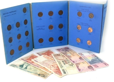 A Great Britain farthing pack 1937-1956, and a group of Singapore and Russian banknotes.