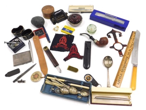 Miscellaneous items, to include a silver engine turned cigarette or calling card case, propelling pencil, paperweights, pens, chrome plated wristwatches, pipe, small selection of coins, etc.