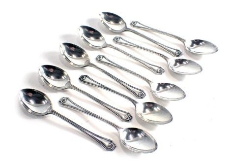 A set of ten George V Art Deco silver teaspoons, each with tapering handle, Birmingham 1931, 5.84oz.