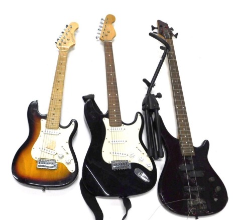 Three electric guitars, comprising an Elevation, Stag, and Encore, together with Stag stand. (4, AF)