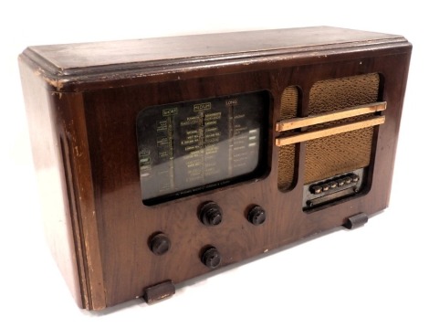 A Michael Radio of London and Slough oak cased radiogram, 35cm high, 62cm wide, 22cm deep.