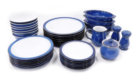 A quantity of Denby dinner wares, to includes salt and pepper shaker, milk jug, dinner plates, sugar bowl and cover, bowls etc., (a quantity).