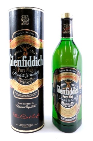 A Glenfiddich Single Malt Scotch Whisky, 1ltr bottle in cardboard tube.