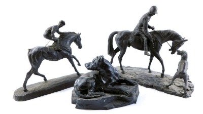 Three resin models, comprising a Capella of Dartington dog on rock, and two resin figures on horseback, one huntsman and one jockey, the largest 26cm high.