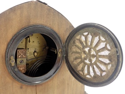 An Edwardian oak mantel clock, with arched top and boxwood tulip inlay and silvered dial, on columned supports with bun feet, thirty hour movement, 25cm high, 26cm wide. (AF) - 4